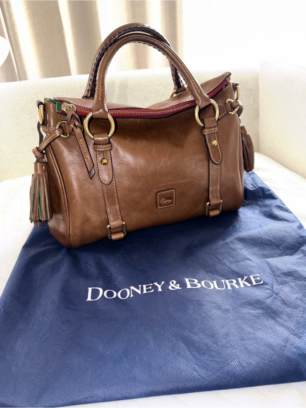Dooney & Bourke Brown Leather Satchel with Tassel Accent